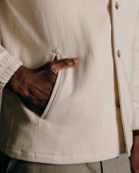 fit model with his hand in his pocket wearing The Crew Jacket in Seeded Natural Sashiko, Outerwear by Taylor Stitch