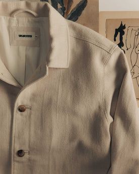 editorial flatlay of The Crew Jacket in Seeded Natural Sashiko, Outerwear by Taylor Stitch