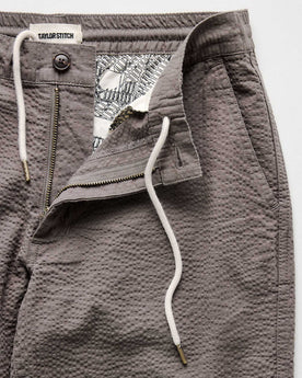 material shot of the zipper on The Easy Pant in Canteen Seersucker, Bottoms by Taylor Stitch