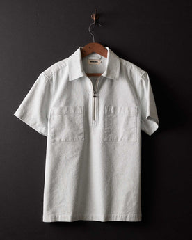 editorial image of The Exhaust Shirt in Natural Stripe hanging, Wovens by Taylor Stitch