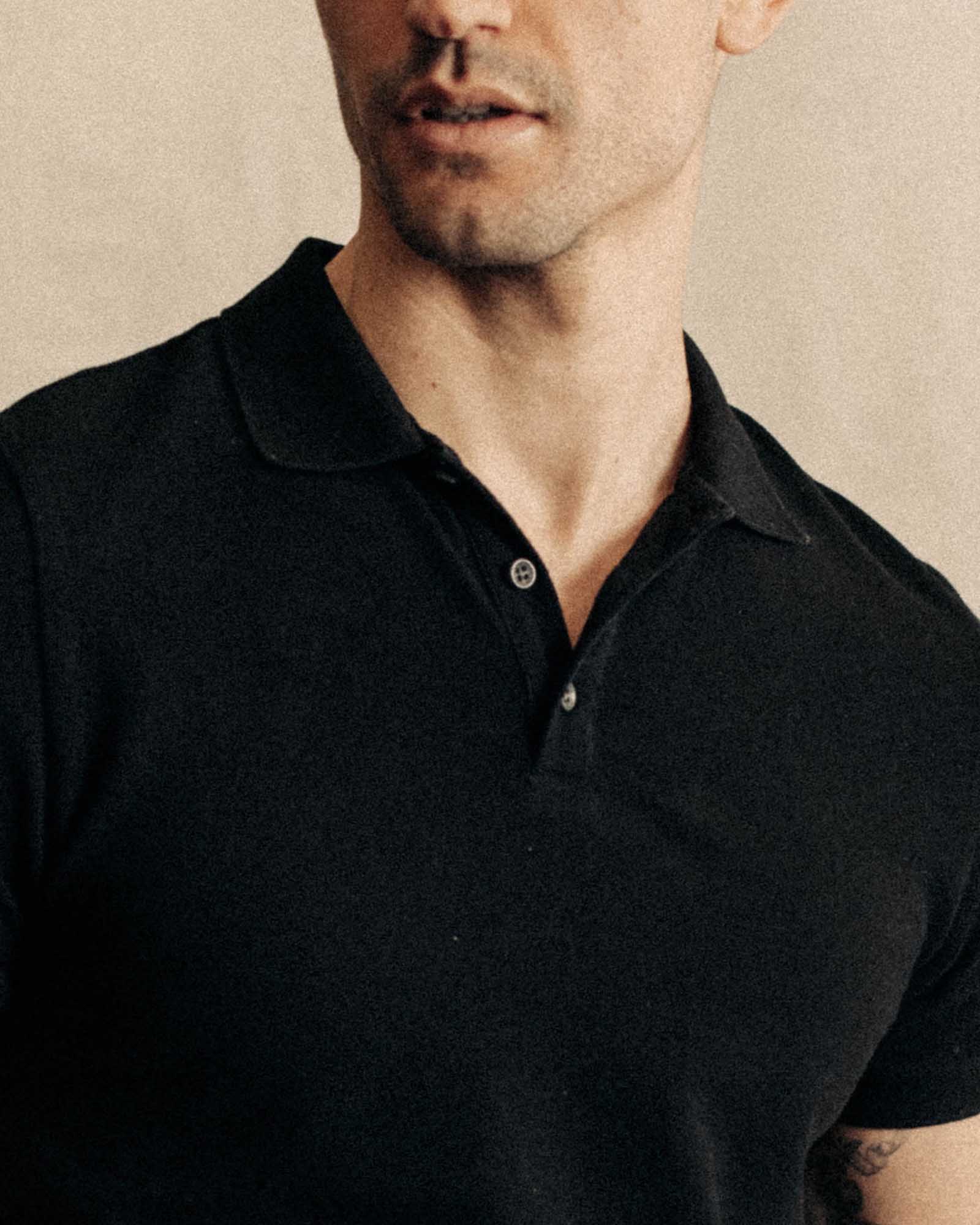 fit model showing off the collar on The Pacific Polo in Black Indigo Pique, Knits by Taylor Stitch
