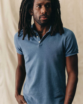 fit model showing off The Pacific Polo in Washed Indigo Pique, Knits by Taylor Stitch