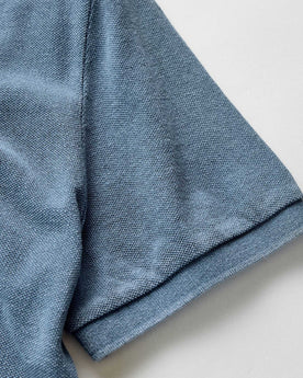 material shot of the sleeve on The Pacific Polo in Washed Indigo Pique, Knits by Taylor Stitch