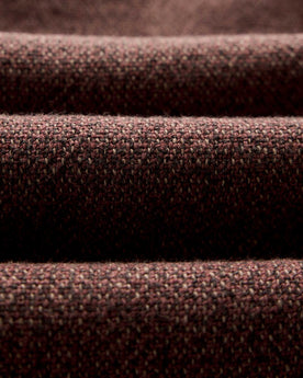 material shot of the texture on The Point Shirt in Burgundy Linen Tweed, Wovens by Taylor Stitch