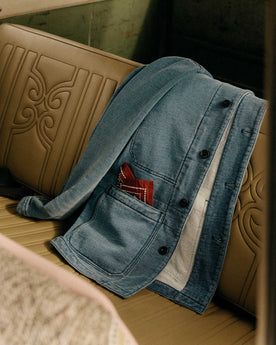 editorial iamge of The Primer Jacket in Washed Indigo Terry in a car, Outerwear by Taylor Stitch