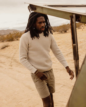 fit model walking wearing The Ranger Sweater in Heather Fog Linen Waffle, Knits by Taylor Stitch