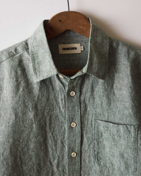 editorial image of The Short Sleeve California in Cilantro Hemp hanging, Wovens by Taylor Stitch