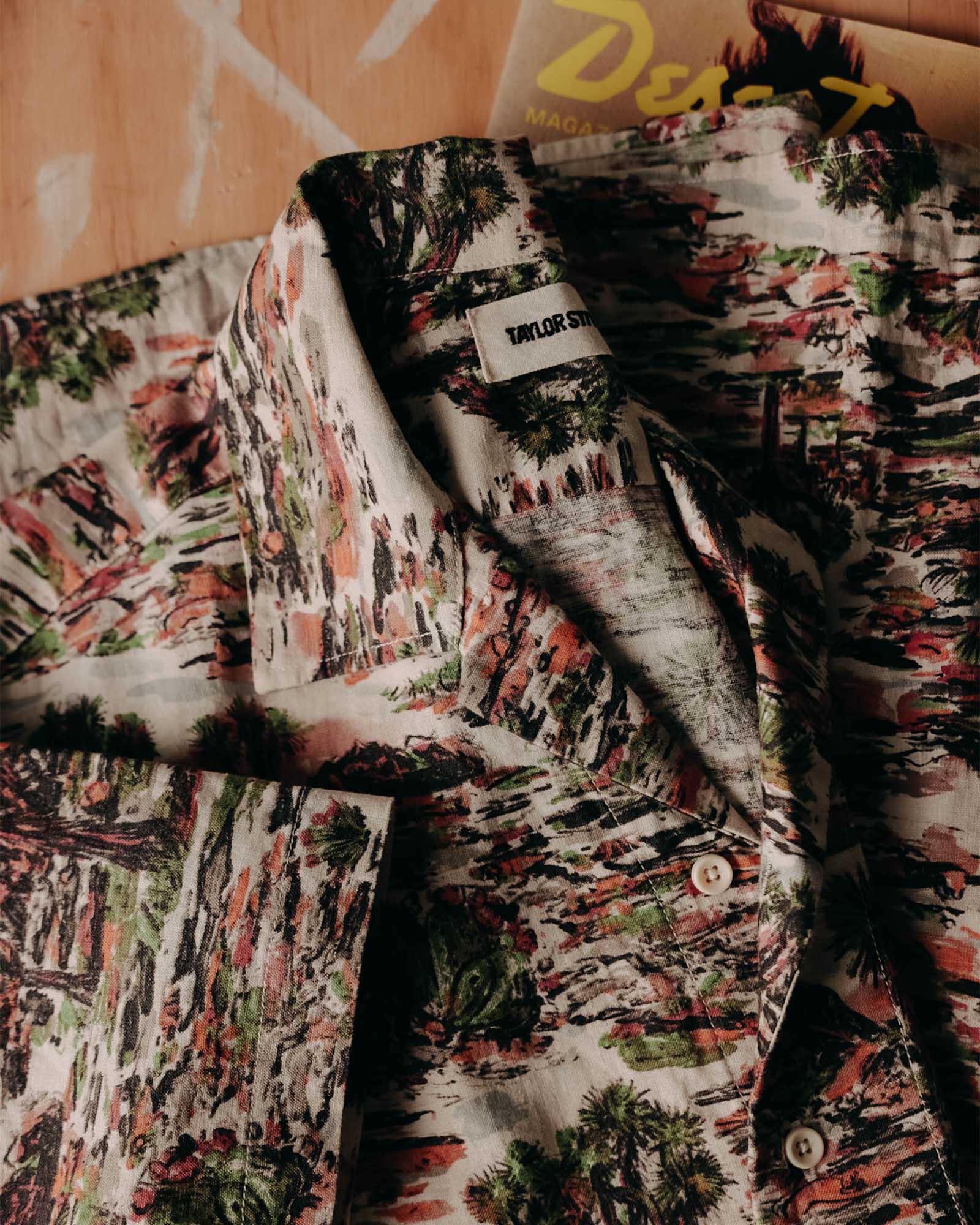 editorial image of The Davis Shirt in Desert Sunset folded, Wovens by Taylor Stitch