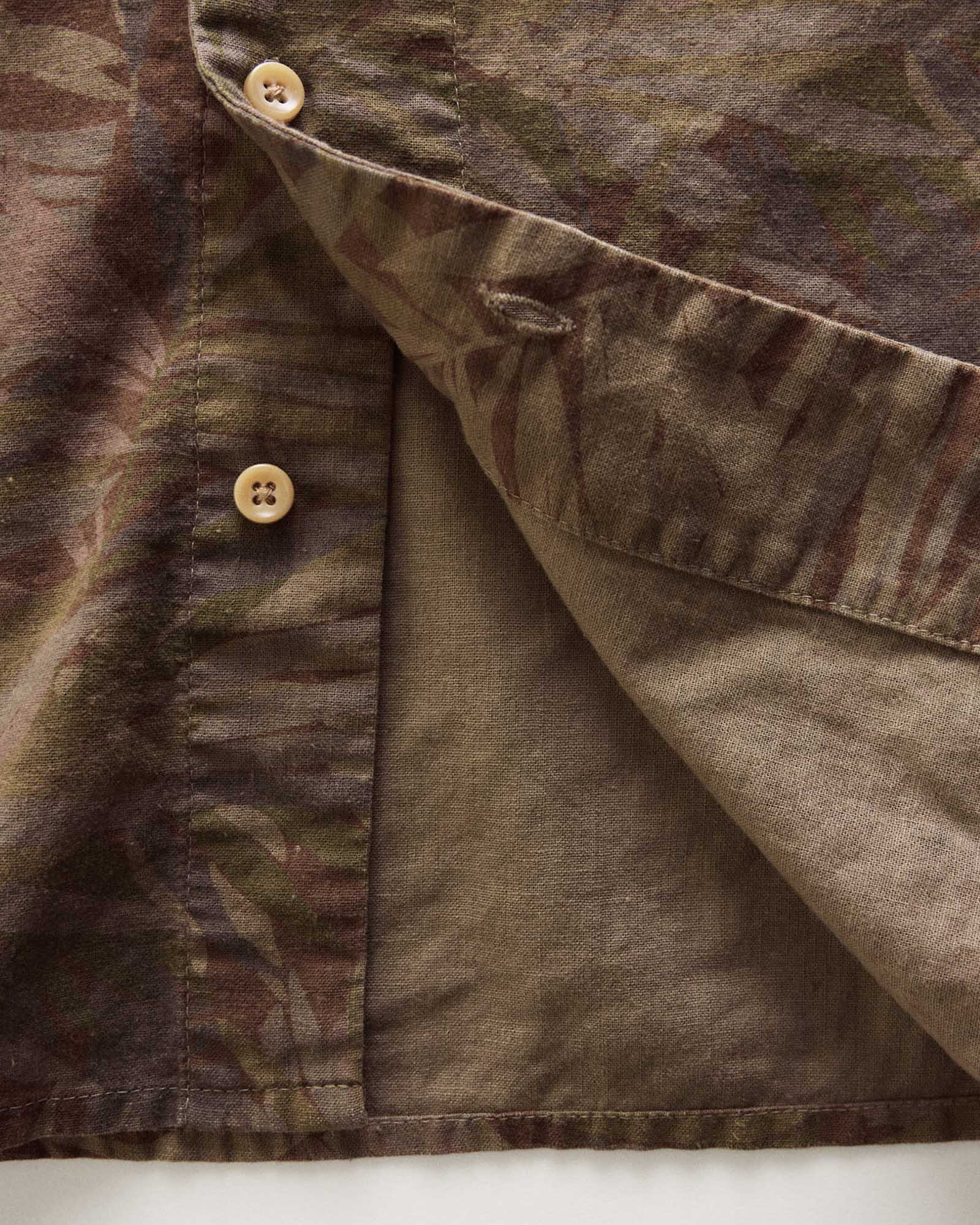 material shot of the buttons on The Hawthorne Shirt in Fatigue Olive Desert Palm, Wovens by Taylor Stitch