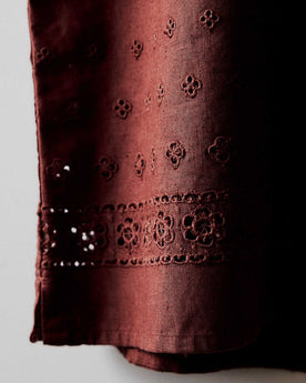 editorial image of the eyelet on The Hawthorne Shirt in Red Wine Border Eyelet, Wovens by Taylor Stitch