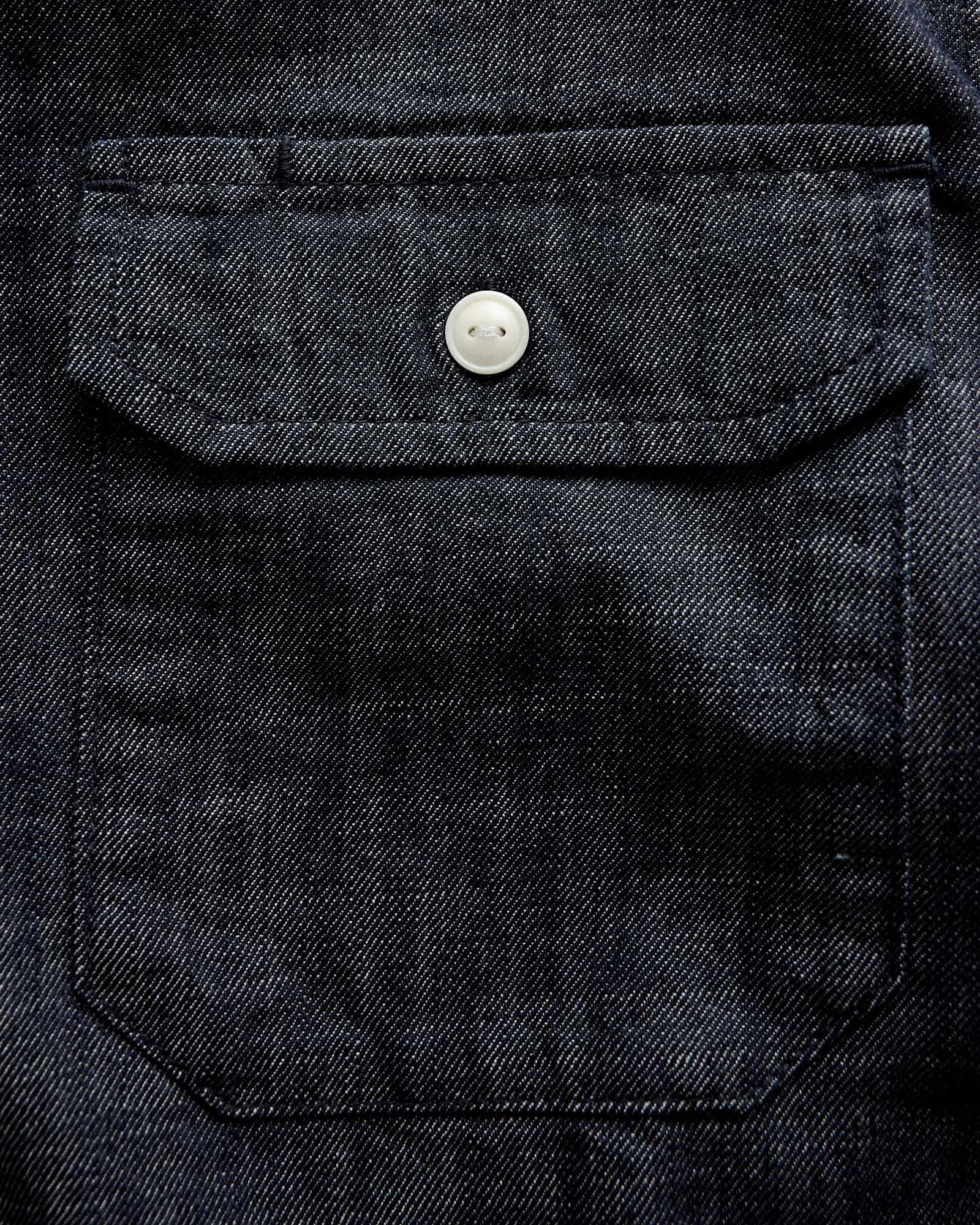 material shot of the pocket on The Short Sleeve Mechanic Shirt in Rinsed Indigo Denim, Wovens by Taylor Stitch