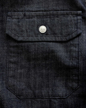 material shot of the pocket on The Short Sleeve Mechanic Shirt in Rinsed Indigo Denim, Wovens by Taylor Stitch
