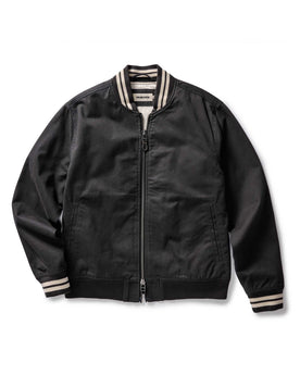 flatlay of The Speedway Bomber in Organic Faded Black Twill, Outerwear by Taylor Stitch