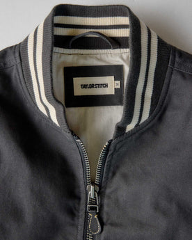 material shot of the collar on The Speedway Bomber in Organic Faded Black Twill, Outerwear by Taylor Stitch
