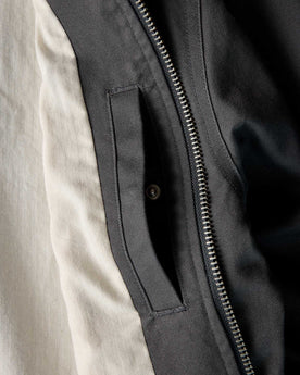 material shot of the inside pocket in The Speedway Bomber in Organic Faded Black Twill, Outerwear by Taylor Stitch