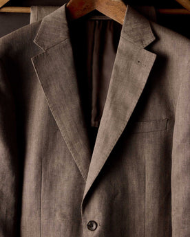 editorial image of The Stevens Sportcoat in Coffee Linen Herringbone hanging, Outerwear by Taylor Stitch
