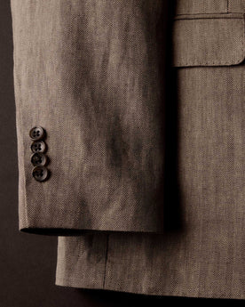 editorial image of the buttons on The Stevens Sportcoat in Coffee Linen Herringbone, Outerwear by Taylor Stitch