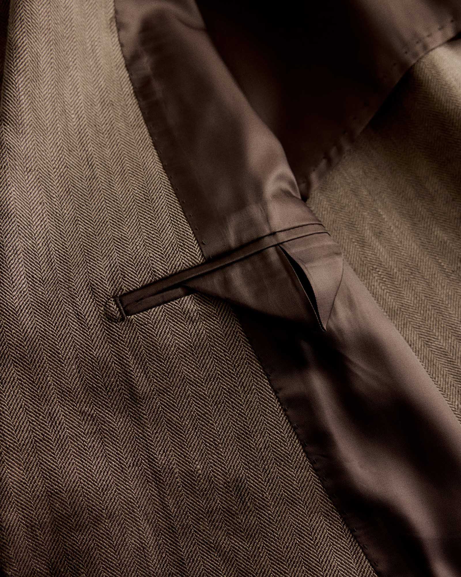 editorial image of the inside pocket on The Stevens Sportcoat in Coffee Linen Herringbone, Outerwear by Taylor Stitch