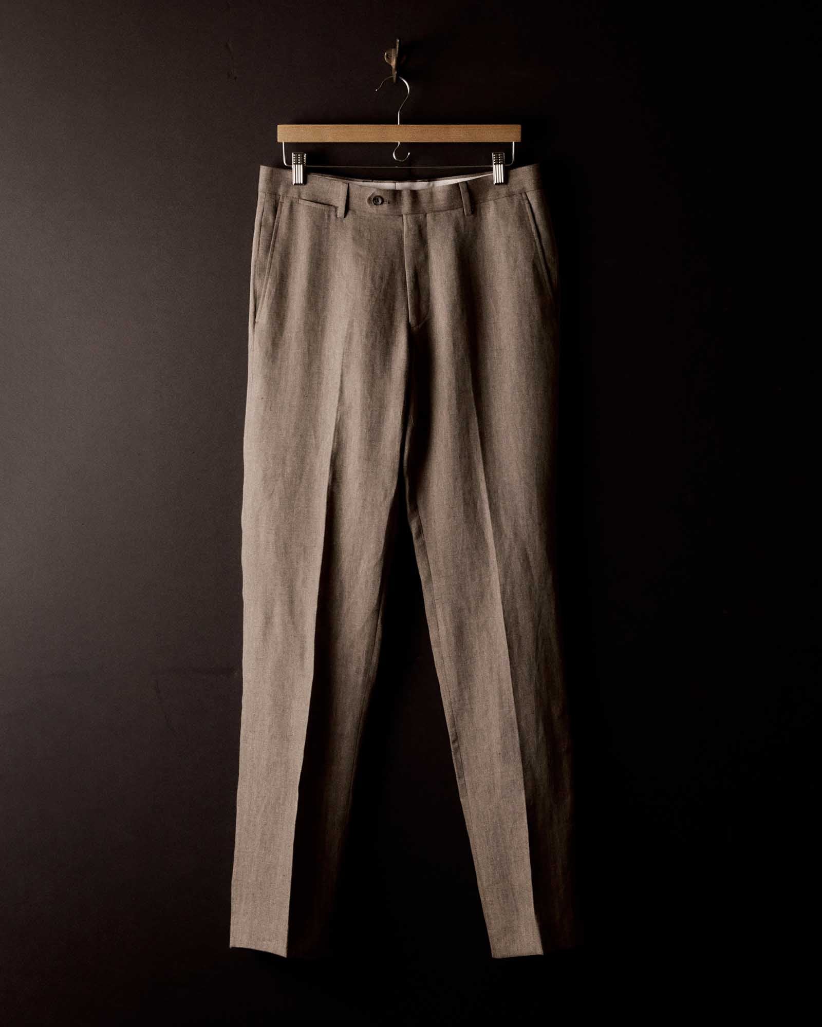 editorial image of The Stevens Trouser in Coffee Linen Herringbone hanging, Bottoms by Taylor Stitch