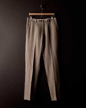 editorial image of The Stevens Trouser in Coffee Linen Herringbone hanging, Bottoms by Taylor Stitch