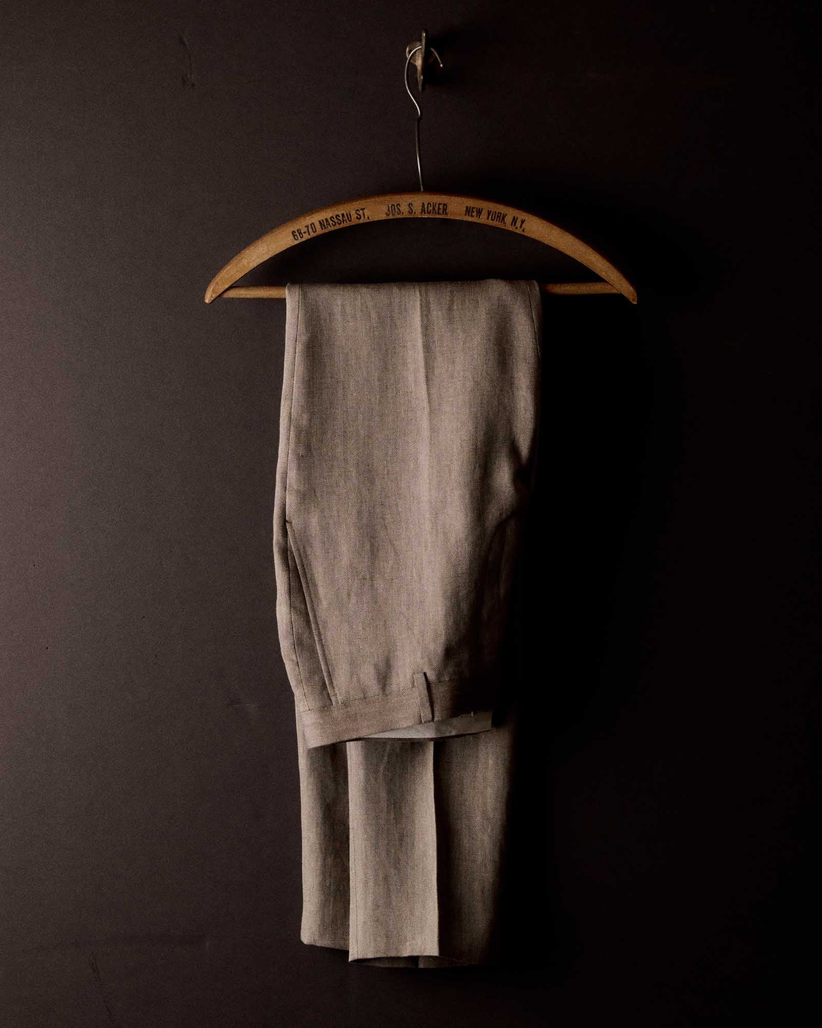 editorial image of The Stevens Trouser in Coffee Linen Herringbone hanging, Bottoms by Taylor Stitch