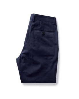 folded flatlay of the back of The Stevens Trouser in Navy Linen Seersucker, Bottoms by Taylor Stitch