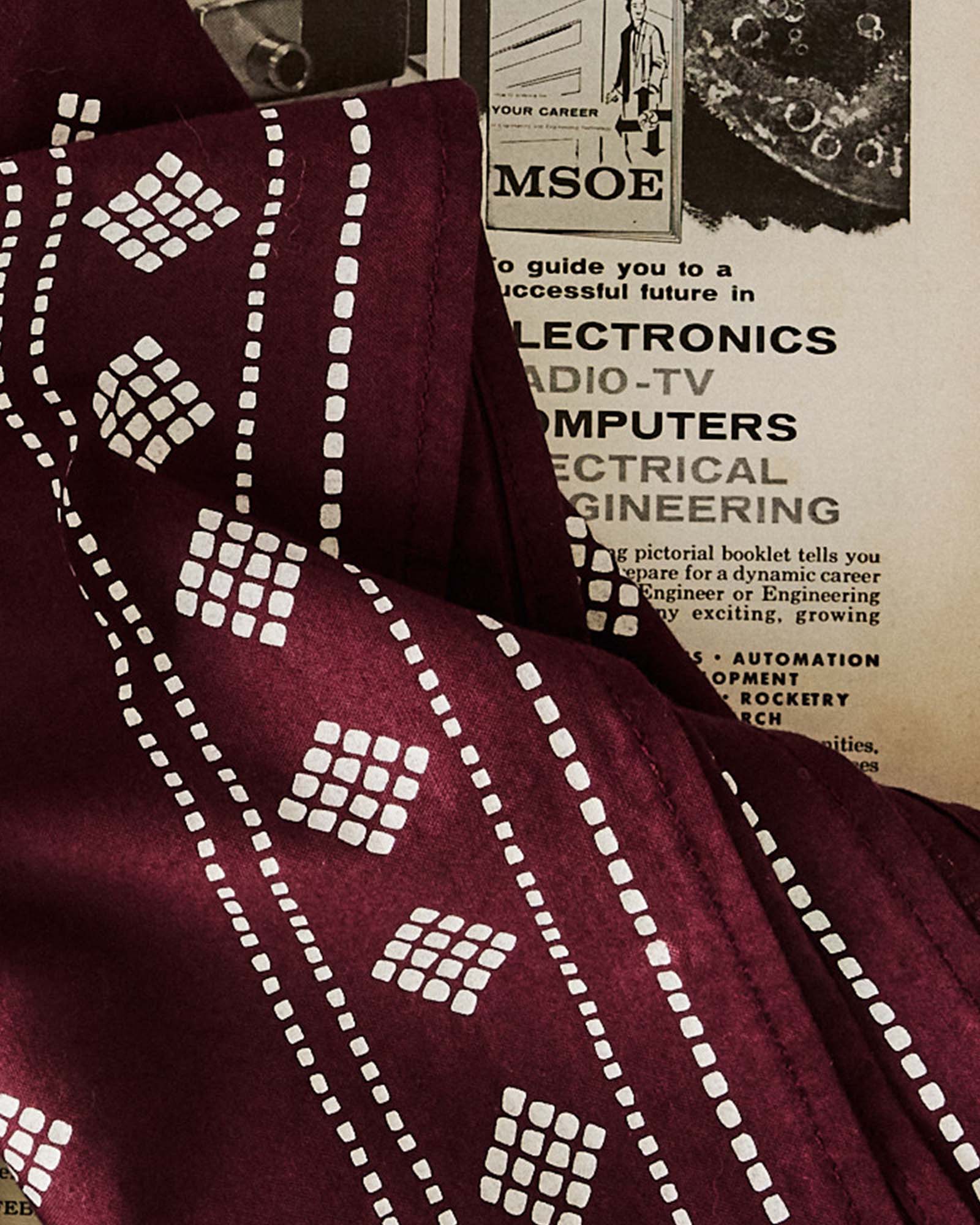 material shot of the hem on The Bandana in Dried Cherry Diamond, Accessories by Taylor Stitch