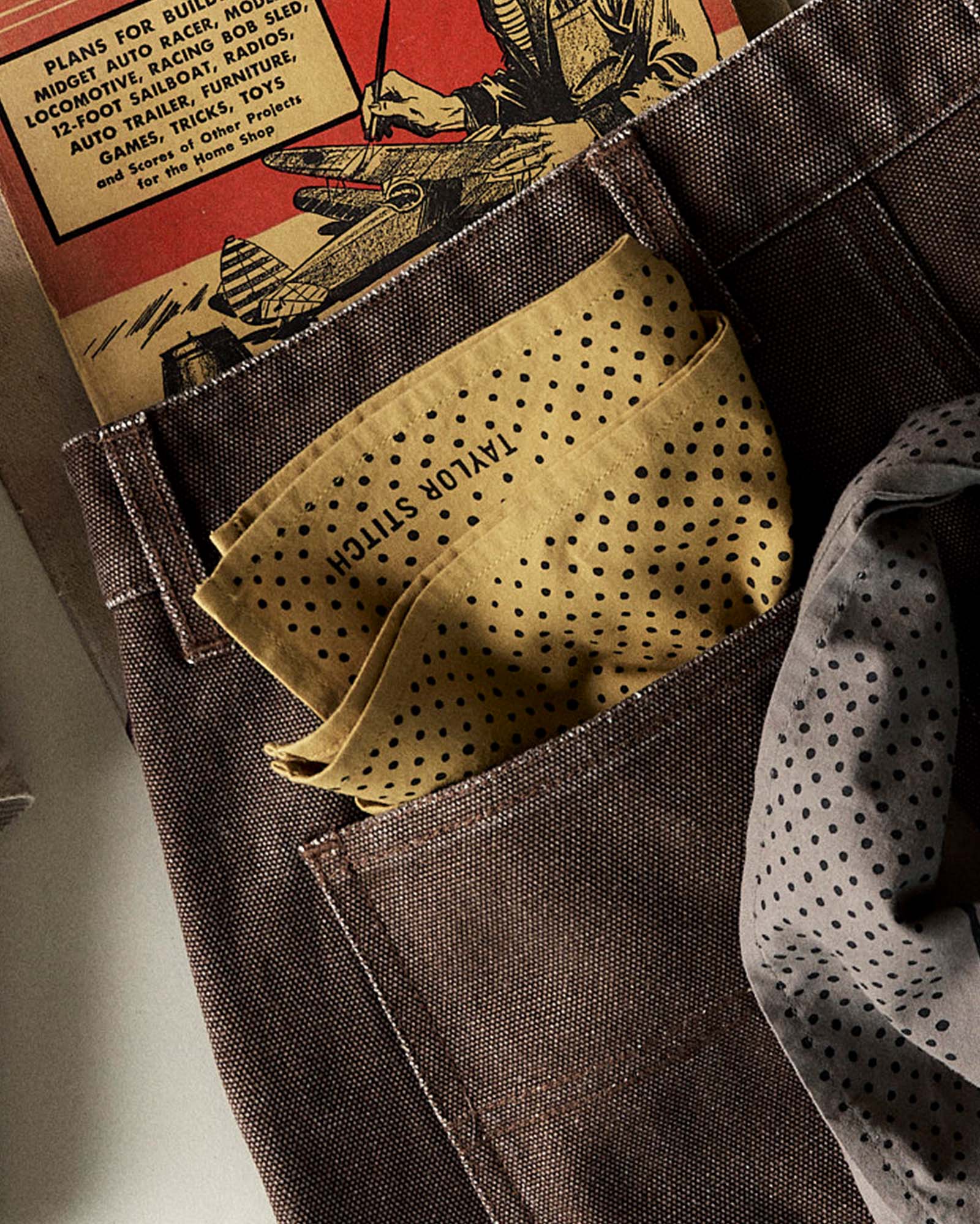 editorial image of The Bandana in Honey Pindot in a pant pocket, Accessories by Taylor Stitch
