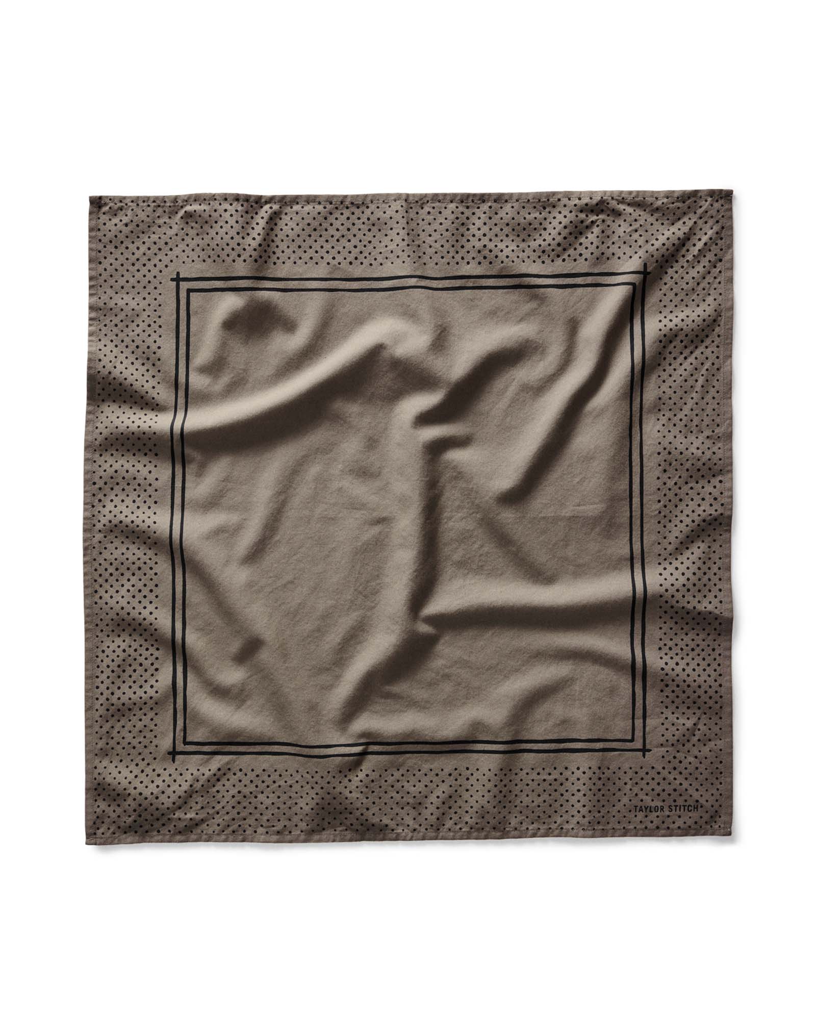 flatlay of The Bandana in Smoked Olive Pindot, Accessories by Taylor Stitch