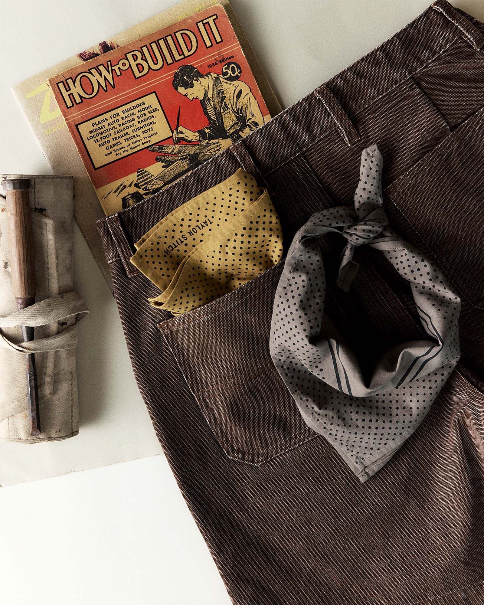 editorial image of The Bandana in Smoked Olive Pindot tied, Accessories by Taylor Stitch