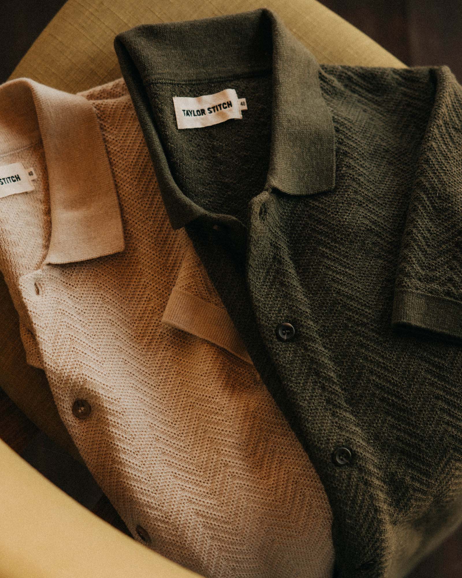 editorial flatlay of The Button Down Polo in Cilantro Herringbone , Knits by Taylor Stitch