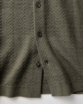 material shot of the buttons on The Button Down Polo in Cilantro Herringbone, Knits by Taylor Stitch