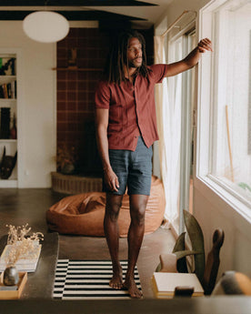fit model showing off The Button Down Polo in Dried Cherry Stripe, Knits by Taylor Stitch