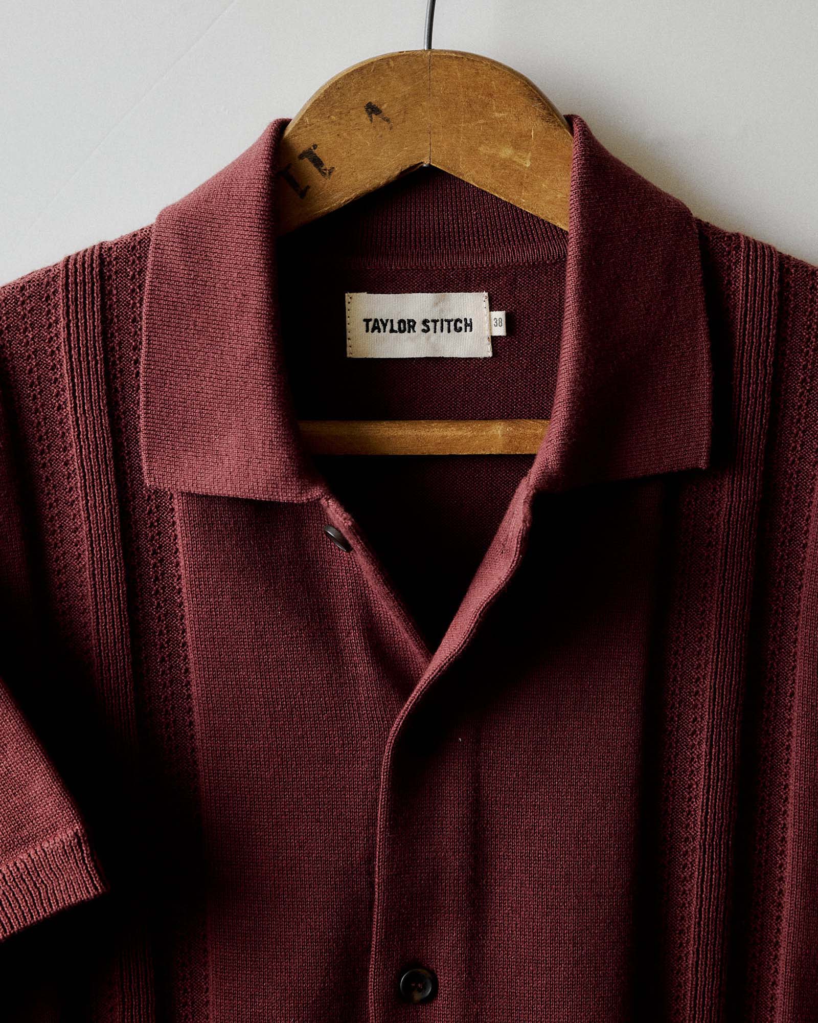 material shot of the collar on The Button Down Polo in Dried Cherry Stripe, Knits by Taylor Stitch
