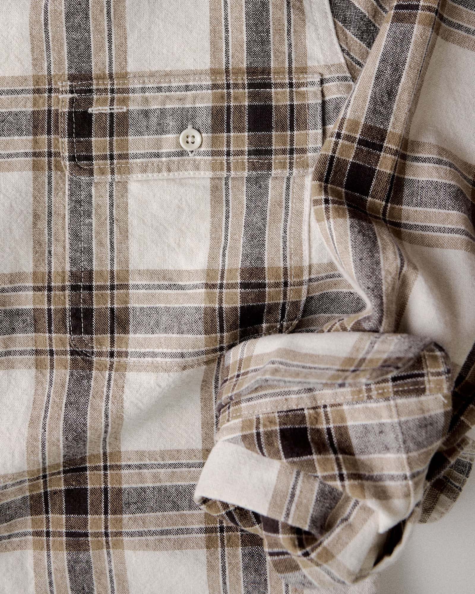 material shot of the cuff on The Craftsman Shirt in Bark Plaid Linen, Wovens by Taylor Stitch