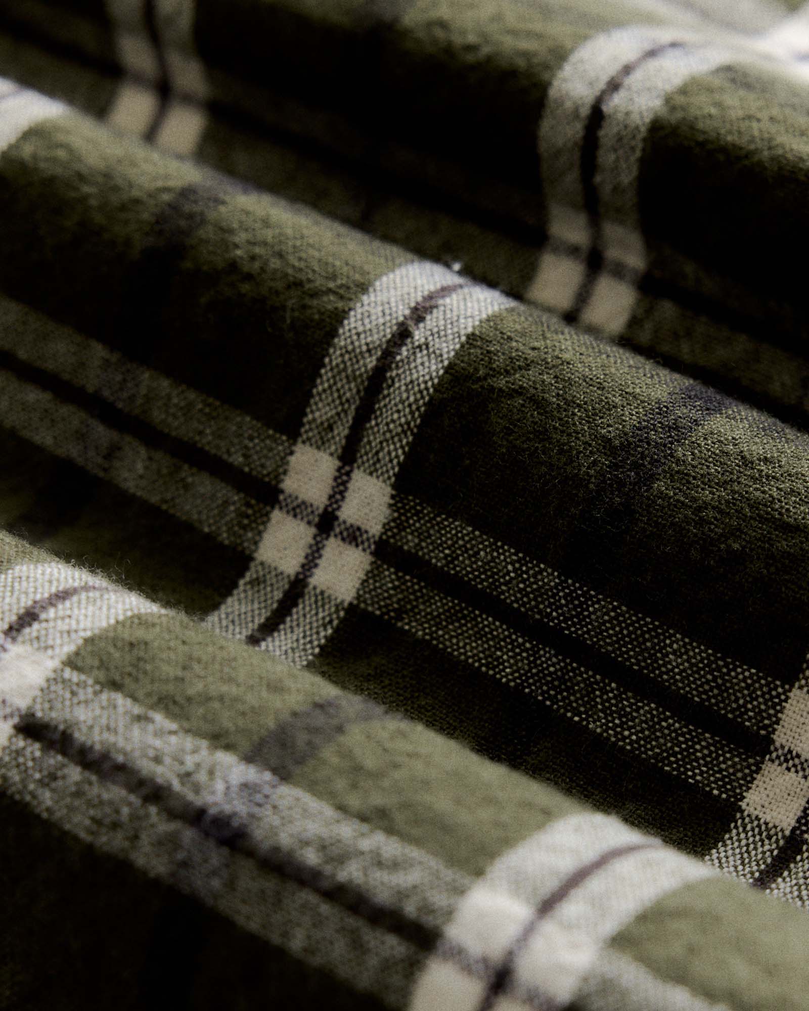 material shot of the fabric on The Craftsman Shirt in Canteen Plaid Linen, Wovens by Taylor Stitch
