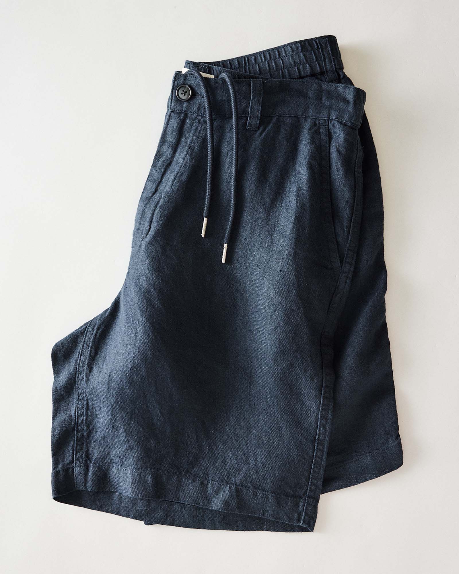 folded flatlay of The Easy Short in Navy Linen, Bottoms by Taylor Stitch