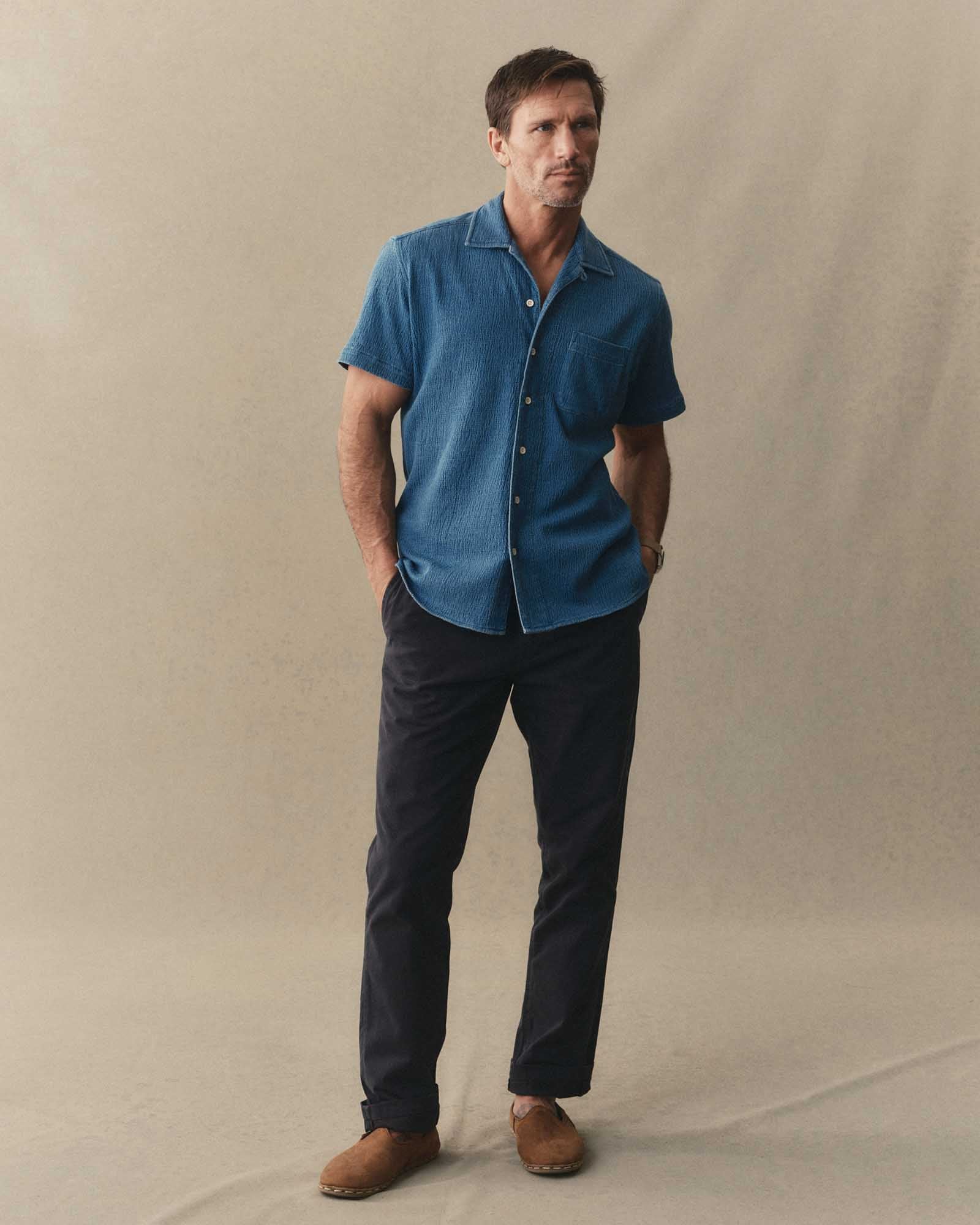 fit model posing in The Hawthorne Shirt in Washed Indigo Crepe, Knits by Taylor Stitch