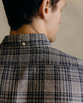 fit model showing off the back of The Jack in Navy Plaid Linen, Wovens by Taylor Stitch