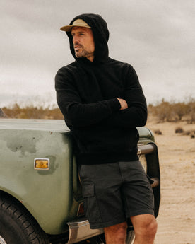fit model posing in The Tommie Short in Faded Black Broken Twill, Bottoms by Taylor Stitch