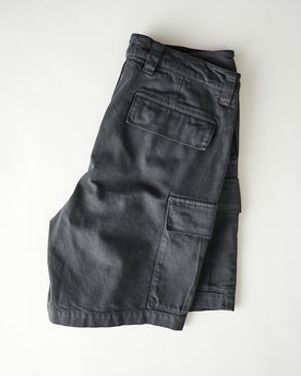 folded flatlay of The Tommie Short in Faded Black Broken Twill, Bottoms by Taylor Stitch