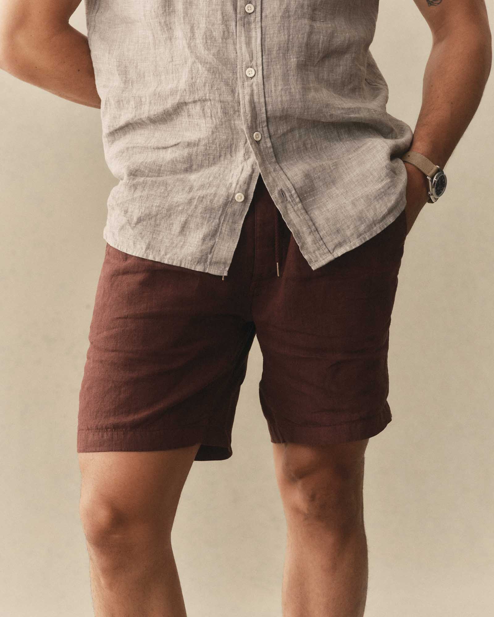 fit model posing in The Apres Short in Burgundy Hemp, Bottoms by Taylor Stitch