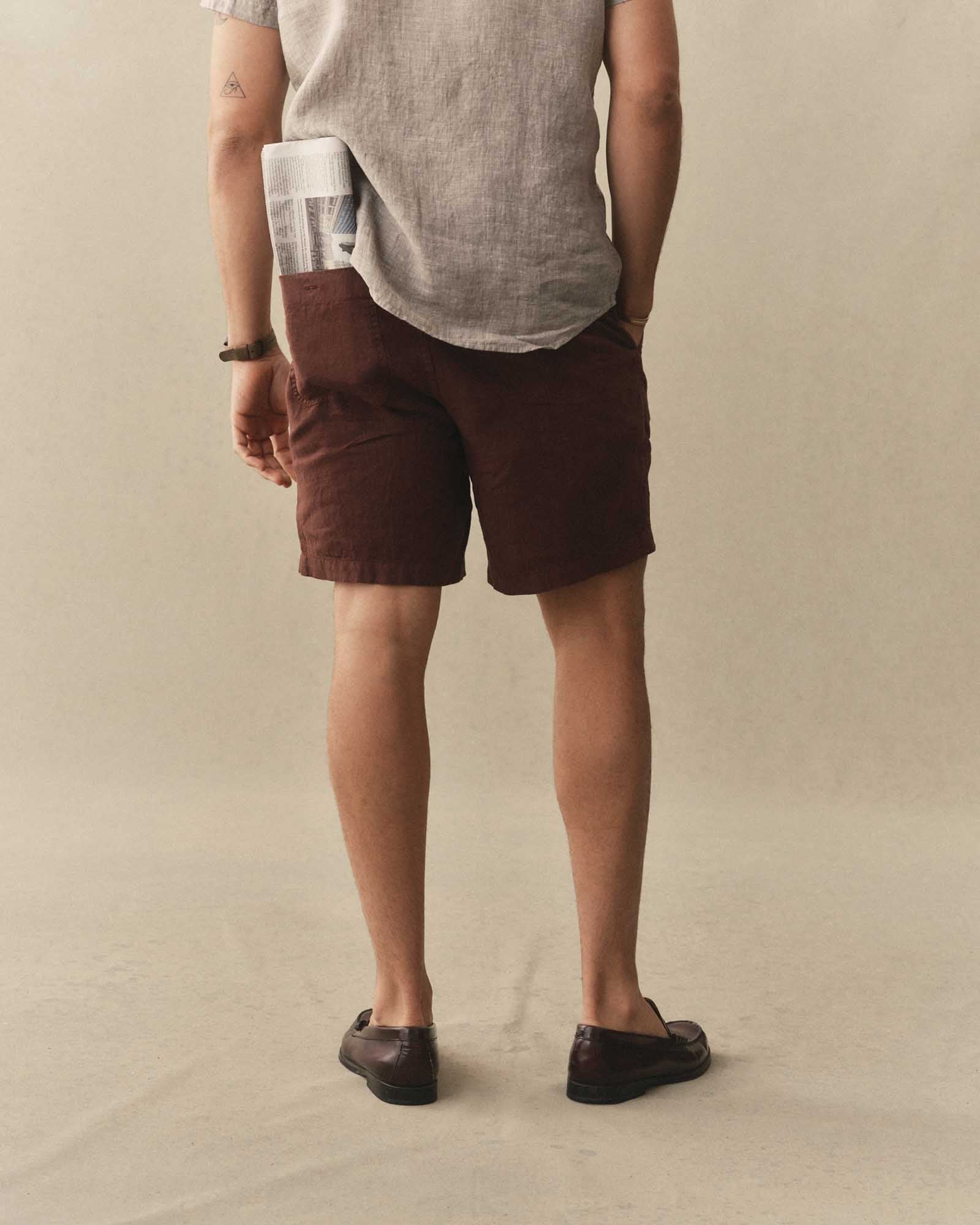 fit model showing off the back on The Apres Short in Burgundy Hemp, Bottoms by Taylor Stitch