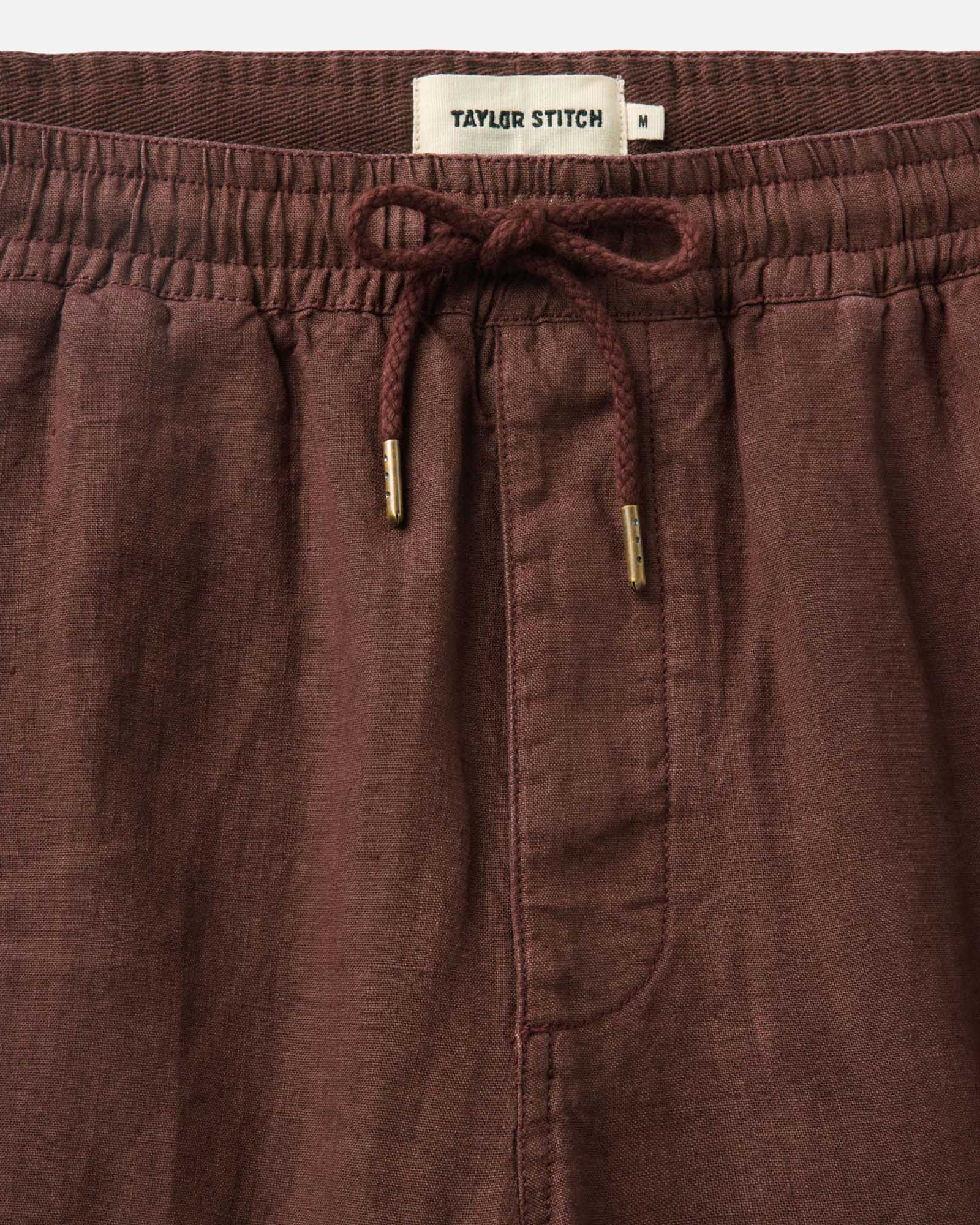 material shot of the waistband on The Apres Short in Burgundy Hemp, Bottoms by Taylor Stitch