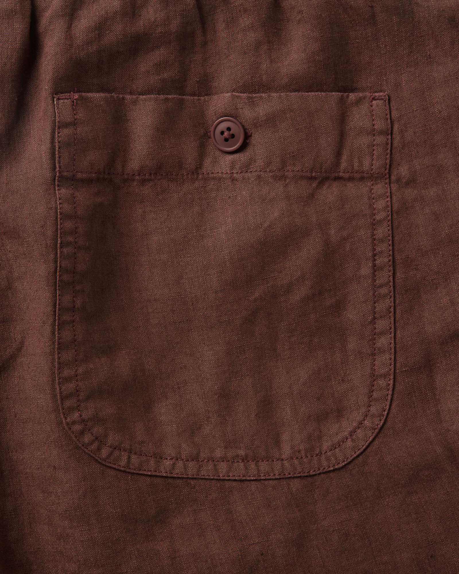 material shot of the back pocket on The Apres Short in Burgundy Hemp, Bottoms by Taylor Stitch