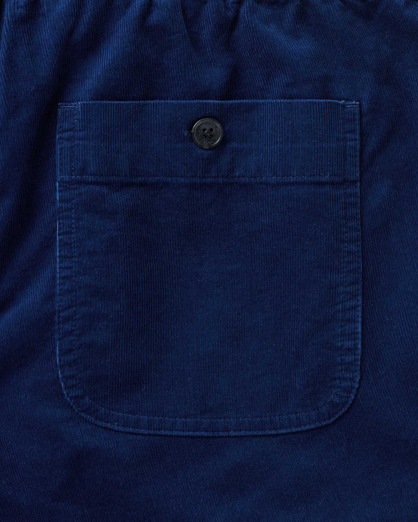 material shot of the pocket on The Apres Short in Rinsed Indigo Pincord, Bottoms by Taylor Stitch