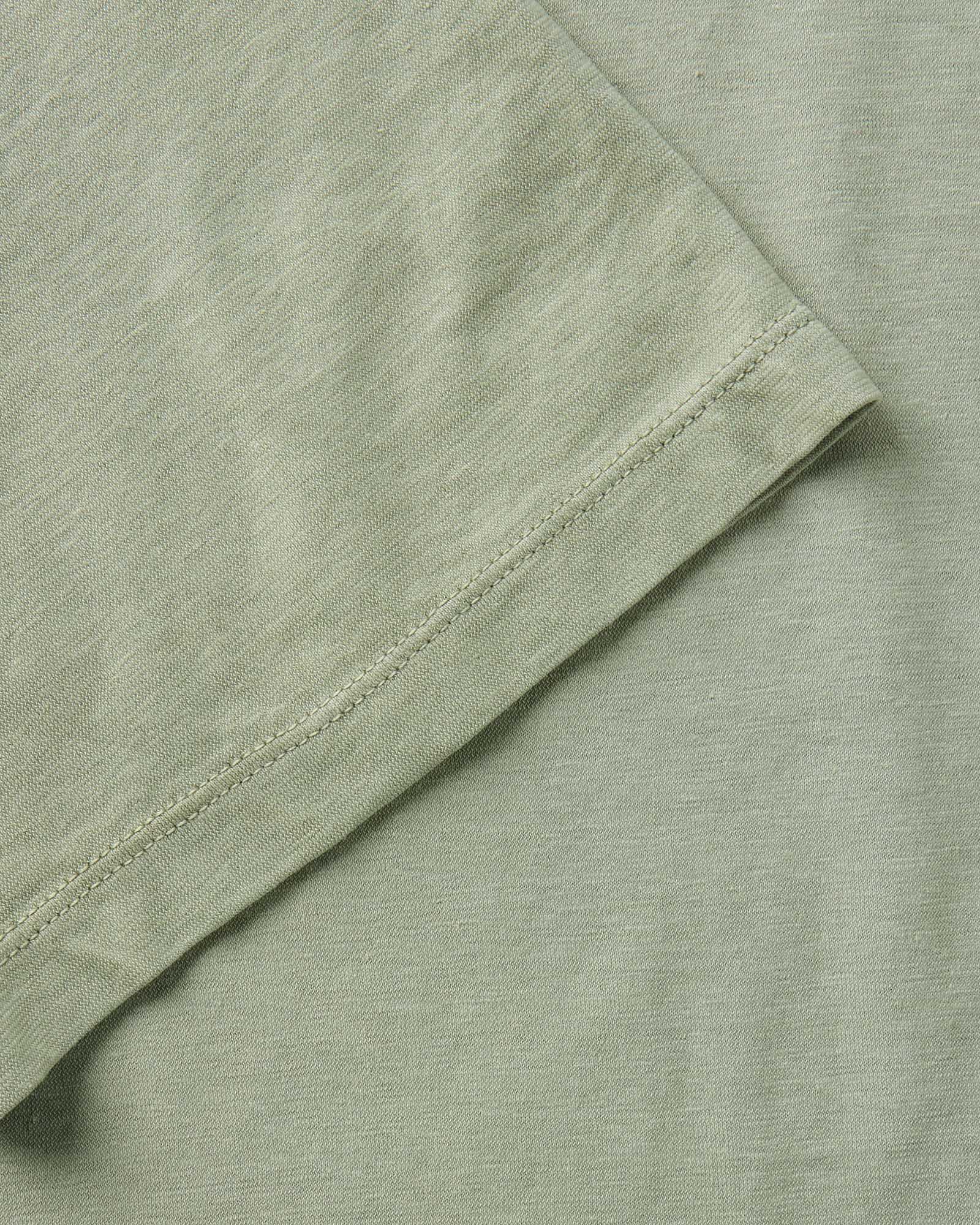 material shot of the sleeve on The Cotton Hemp Tee in Sage, Knits by Taylor Stitch