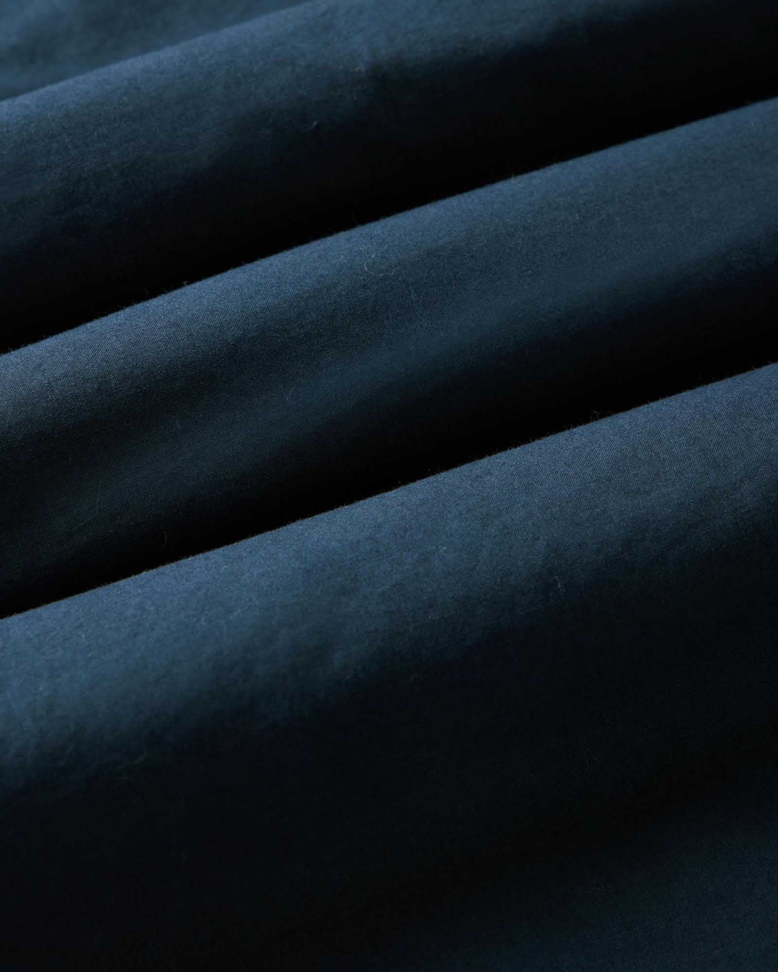 material shot of the fabric on The Davis Shirt in Navy Floral Embroidery, Wovens by Taylor Stitch