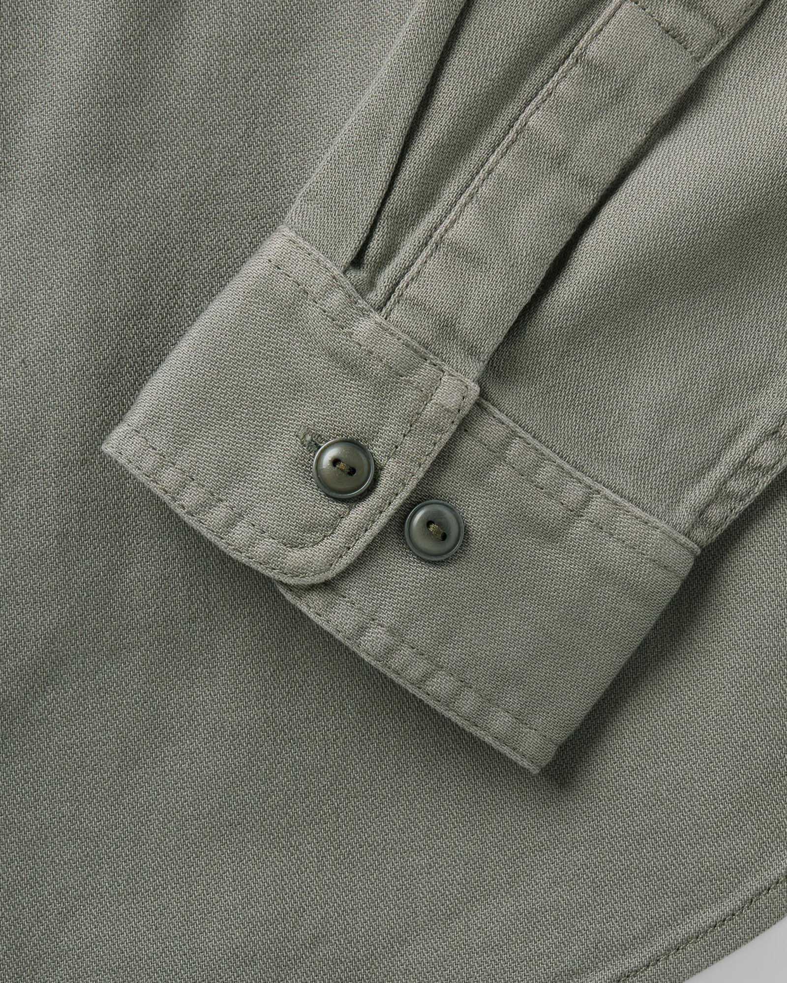 material shot of the sleeve on The Dispatch Shirt in Smoked Olive Broken Twill, Wovens by Taylor Stitch