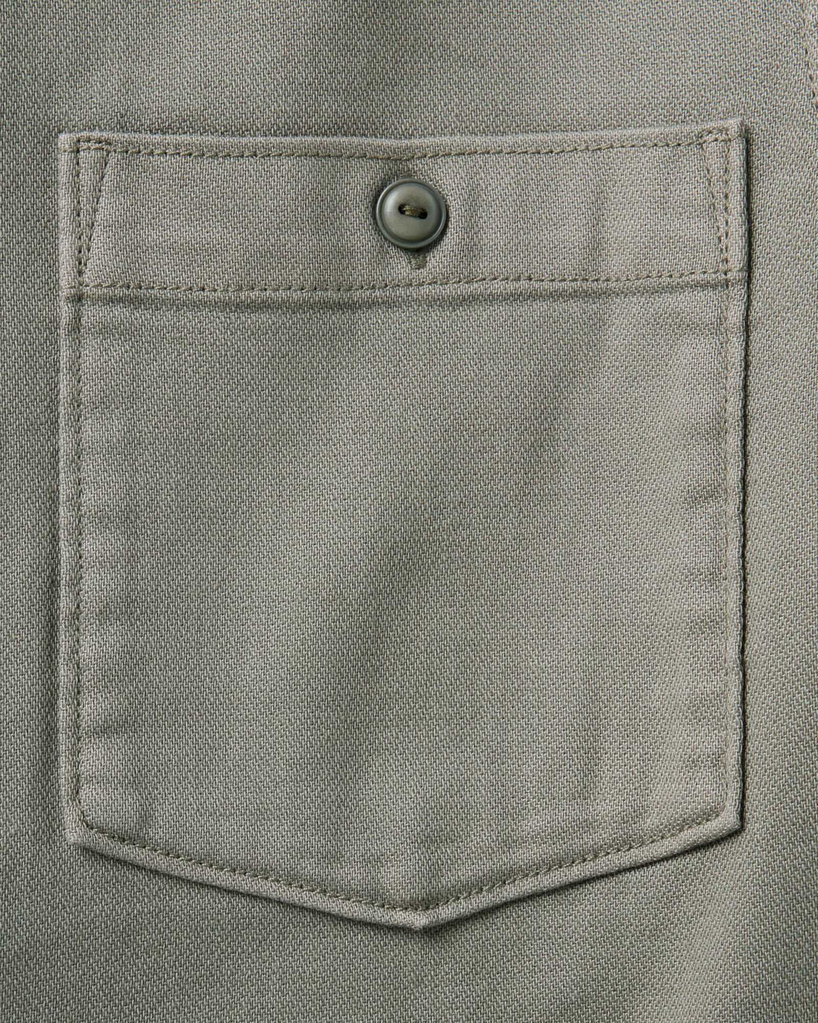 material shot of the pocket on The Dispatch Shirt in Smoked Olive Broken Twill, Wovens by Taylor Stitch